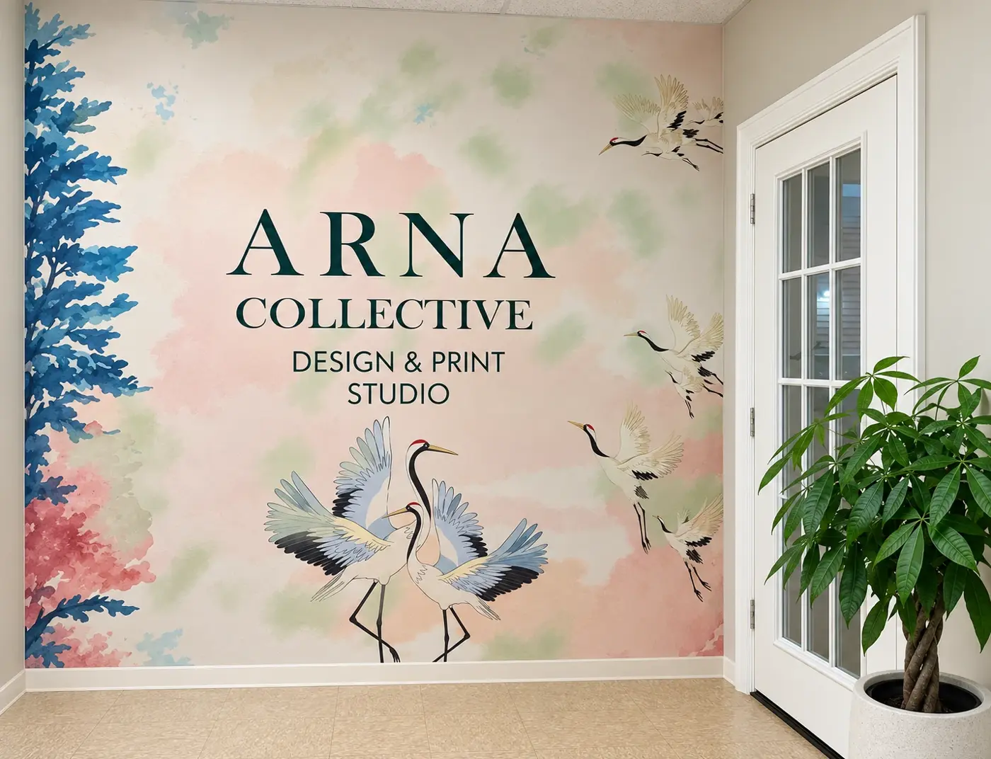 Interior wall printed with the Arna Collective wordmark over watercolor washes, painted birds and foliage
